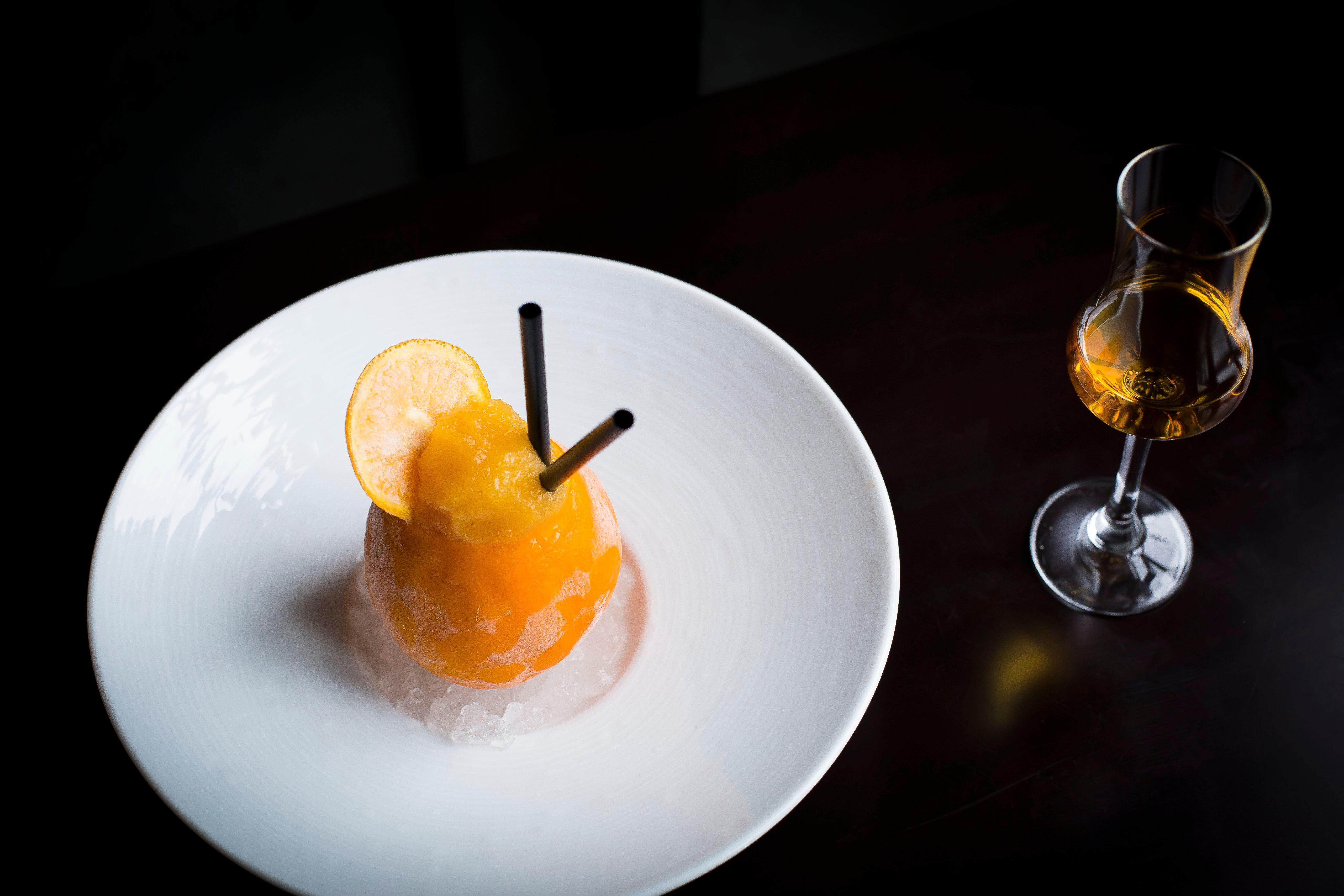 Intercontinental Bordeaux Le Grand Hotel By Ihg Dış mekan fotoğraf A glass of orange sorbet